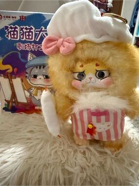 Plush Cat Keychain with Pink Striped Outfit and White Hat